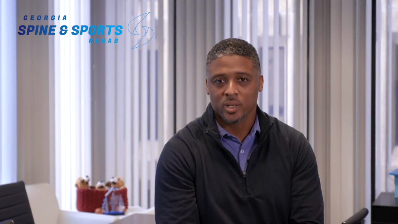 Warrick Dunn recording a message about Dr. Joe Krzemien